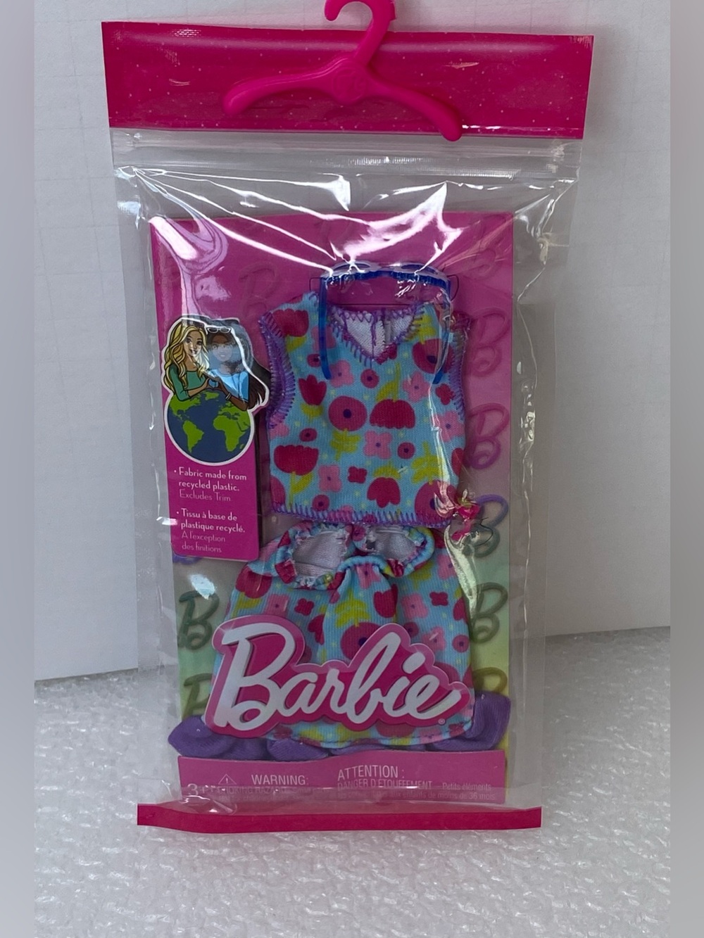 Barbie Fashion Pack Purple Floral Top, Skirt &
Glasses Outfit HRH39